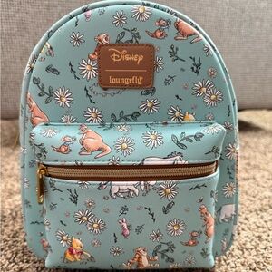 Loungefly Disney Pastel Blue Winnie the Pooh Sketch Daisies Mini Backpack